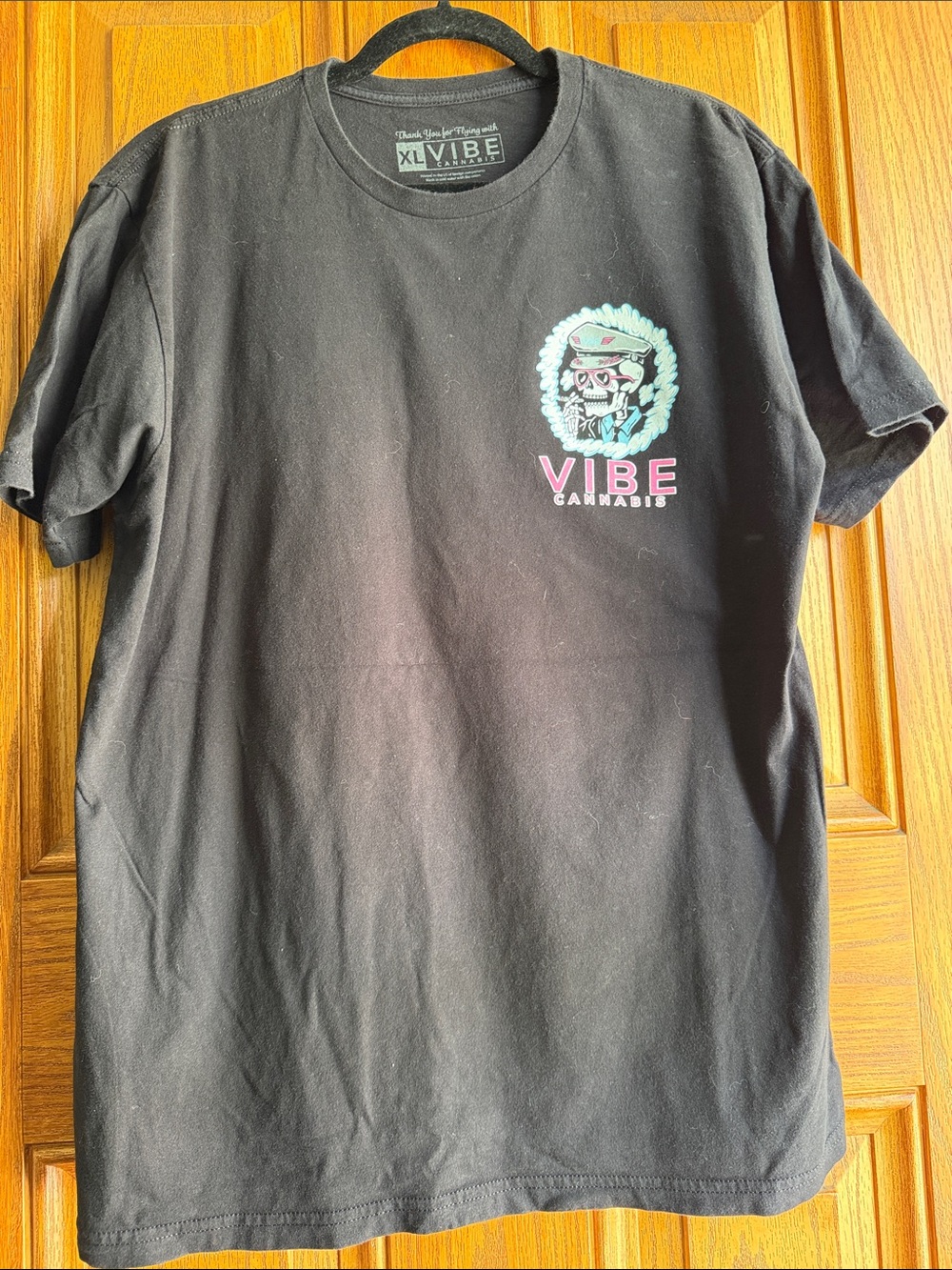 Vibe Black Tee with Pink and Teal Cannabis Logo